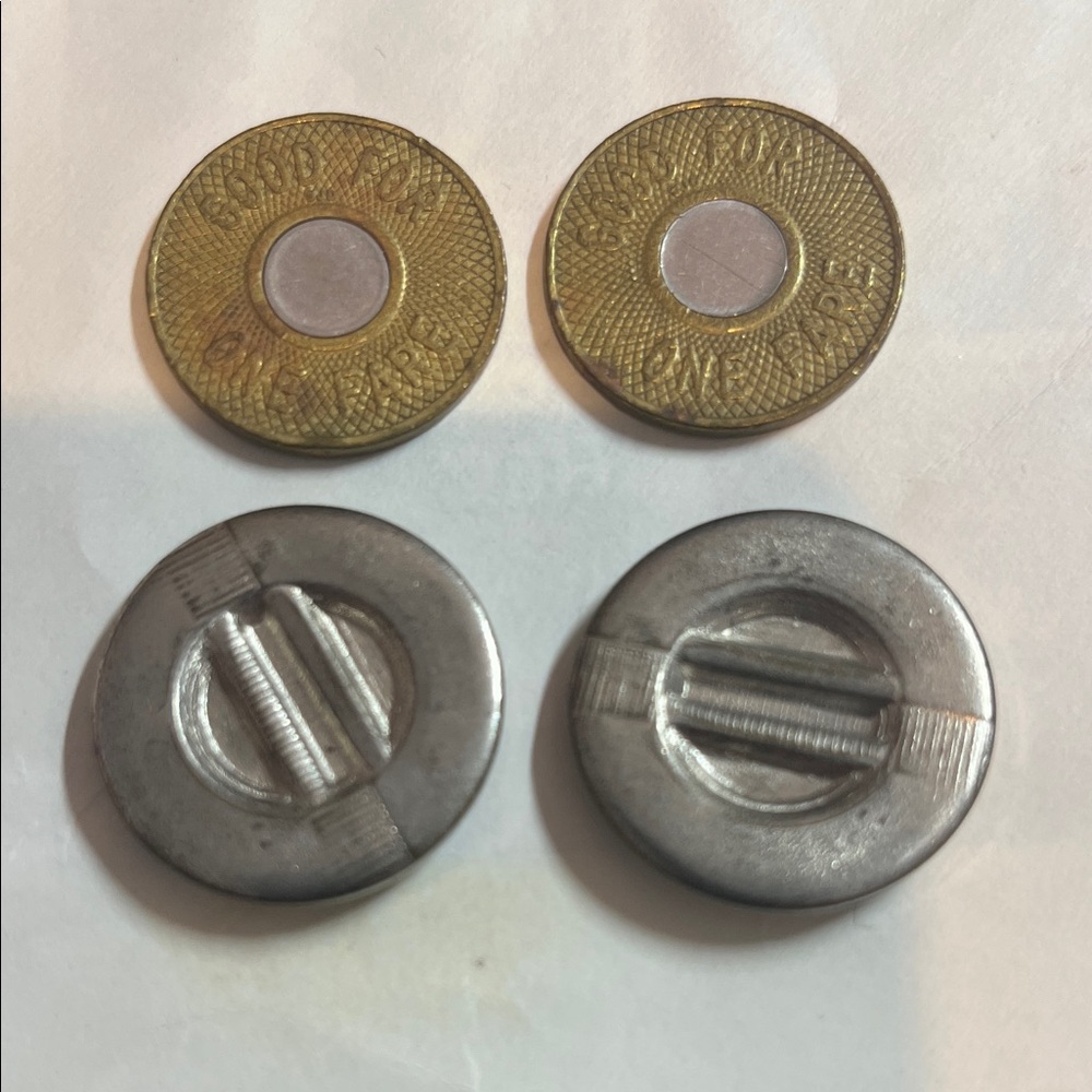 Two New York City Transit Authority tokens. Two Range Servant tokens